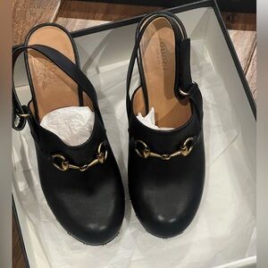 Gucci Women's Black Leather Mules with Gold Accent